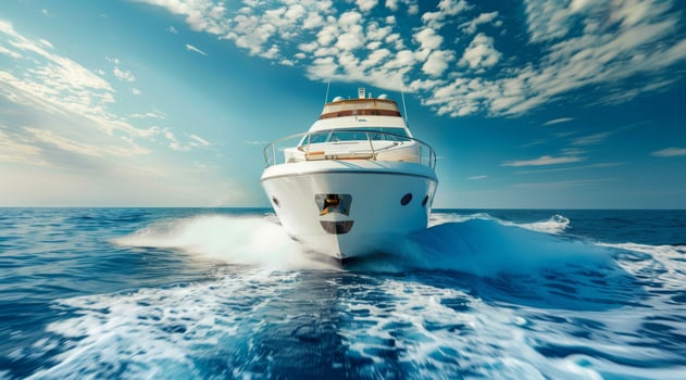 An absolutely stunning luxury yacht smoothly glides through the crystalclear ocean waters beneath a beautiful sky photo