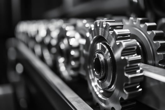 Closeup of metal gears forming a complex mechanism photo