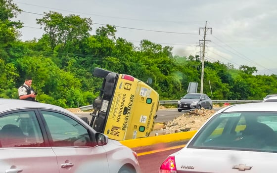 Playa del Carmen Quintana Roo Mexico 2023 Overturned cash transport Road accident on highway in Mexico. photo