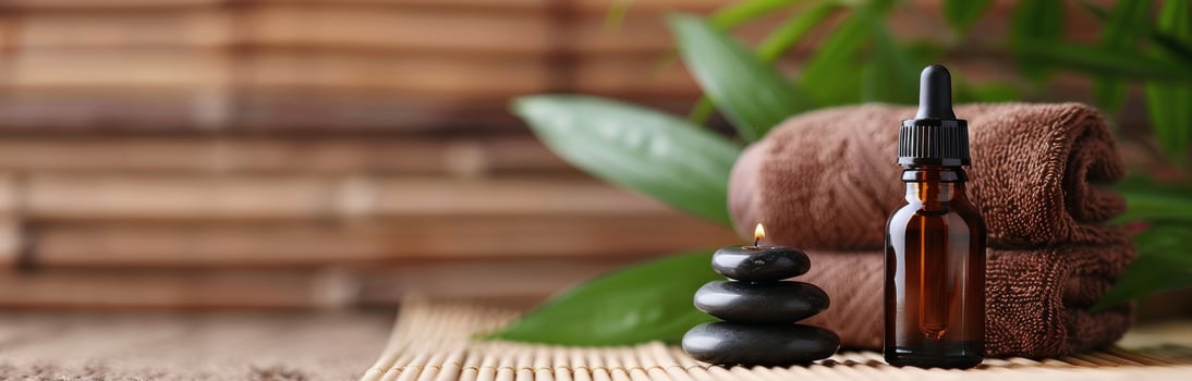 Aromatherapy Essentials With Stones And Towels In A Serene Spa Setting photo