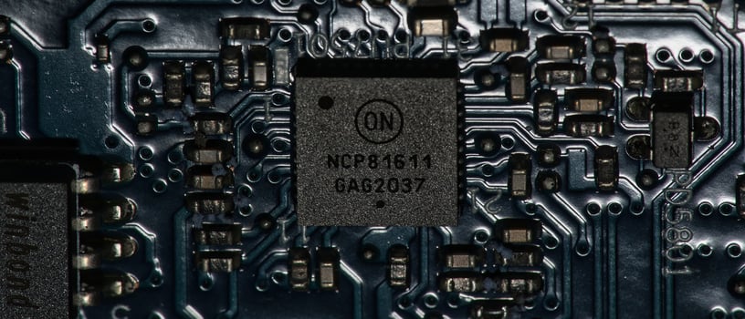 a close up of a circuit board with a chip photo