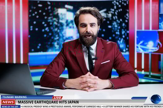 Reporter presents earthquake news in newsroom, live night show program talking about natural disaster and japan victims. News anchor broadcasting breaking news information on tv. photo