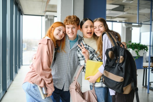 group of young college students in classroom photo