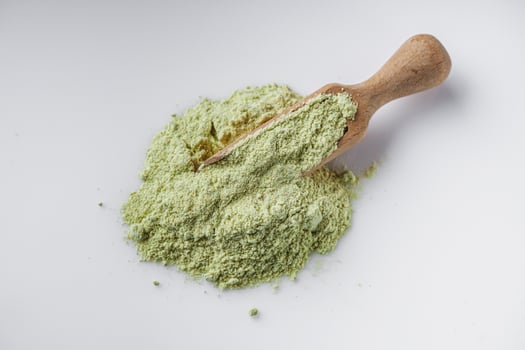 Fragrant wasabi powder on a white background photo