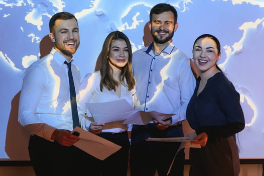 Group of business people smiling on camera. Fron View photo