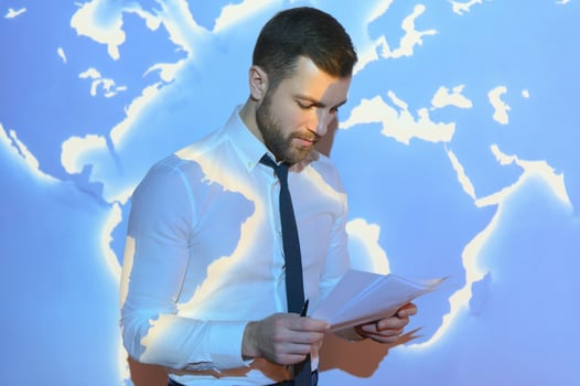 businessman on the background of the world map, international economy. photo