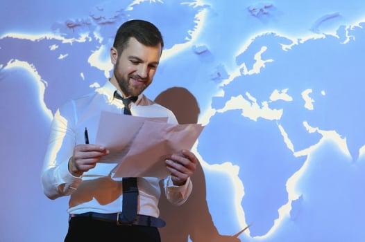 businessman on the background of the world map, international economy. photo