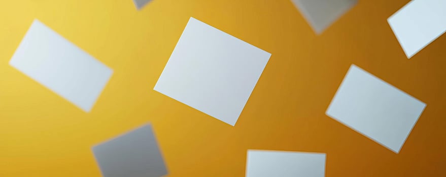 3d render of a various blank white paper cards with rounded corners floating around over a dark yellow studio background Shallow depth of field Dramatic lighting photo