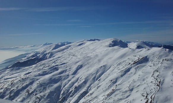 The snowy ridge and slopes of Shar Mountain, on a sunny january day photo