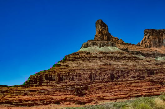 Layered geological formations of red rocks in Canyonlands National Park is in Utah near Moab. photo