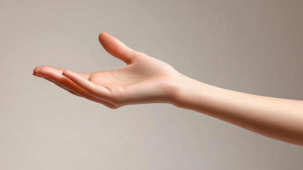 A Single Hand Outstretched With Palm Up photo