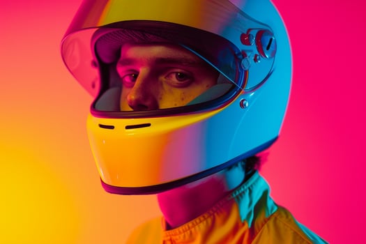 Trendy Fashion Male Model in Neon Yellow Fashion Helmet Lifestyle portrait with Neon pink Background photo