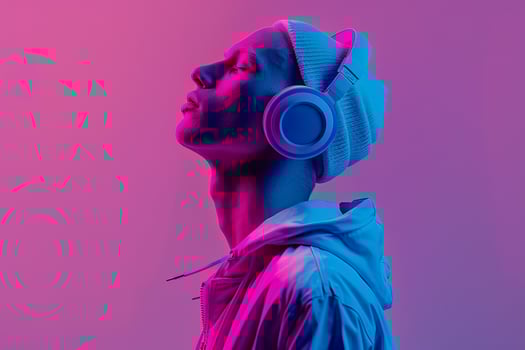 Handsome Fashion Male Model in Glossy Headphones with Neon purple Background Trendy Lifestyle portrait for Modern Males Fashion photo