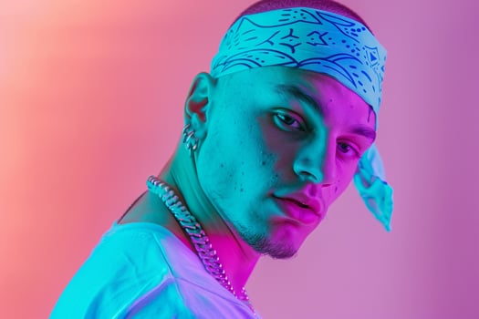 Handsome Fashion Male Model in Neon Aqua Bandana with Neon purple Background Highlighting Modern Males portrait Style photo