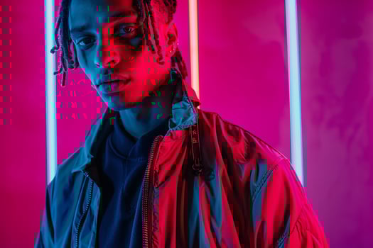 Fashionable Fashion Model in Trendy Jacket with Neon Coral portrait Background Offering a Stylish and Bold Appearance with a Vibrant Background photo