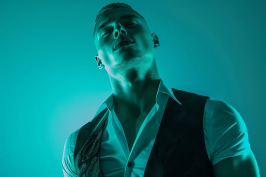 Casual Vest with Neon Aqua Lifestyle Trendy Male Fashion portrait with a vivid Neon Aqua background adding a modern touch to the vest photo