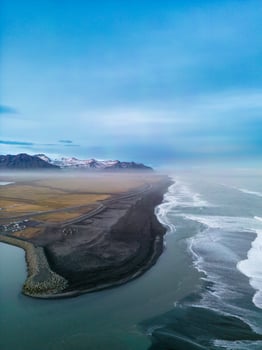 Aerial view of atlantic ocean with black sand beach in icelandic natural scenery, amazing nordic landscape with shoreline in iceland. Spectacular country with magical surroundings. photo