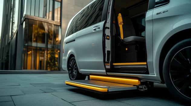 This modern minivan features a sleek design and an extended ramp for easy wheelchair access, improving usability and aesthetics for passengers needing better mobility and transportation solutions photo
