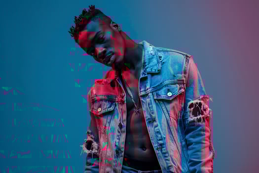 elegant Fashion Model in a Ripped Denim Jacket with an electric Blue Background Modern Male portrait Fashion Focus photo