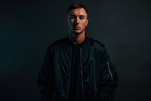 Stylish Fashion Model in Urban Bomber Jacket in Graphite Black Modern Lifestyle portrait with Trendy Background photo