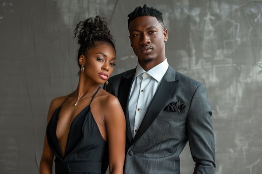 Couple in Tailored Suits with Soft Grey Urban Lifestyle portrait Featuring Classy Male Fashion Details Ideal for elegant and Sophisticated Urban Settings photo