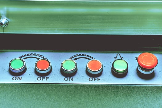 Red and green buttons switch for turn on turn off machine tool, equipment photo