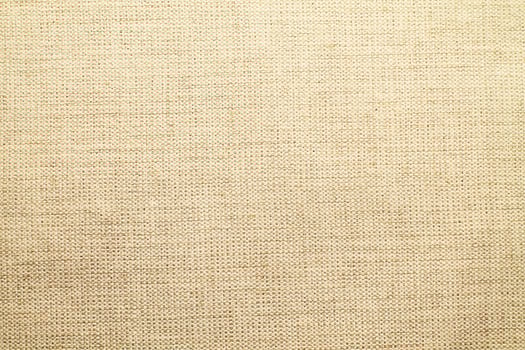 Natural linen material textile canvas Fabric texture background Close-up detail of fabric natural color Hemp material pattern design wallpaper. can be used as background or for graphic design photo