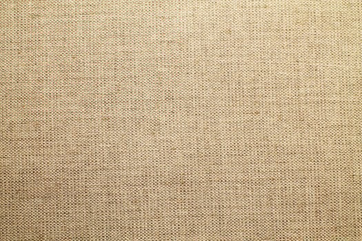 Natural linen material textile canvas Fabric texture background Close-up detail of fabric natural color Hemp material pattern design wallpaper. can be used as background or for graphic design photo