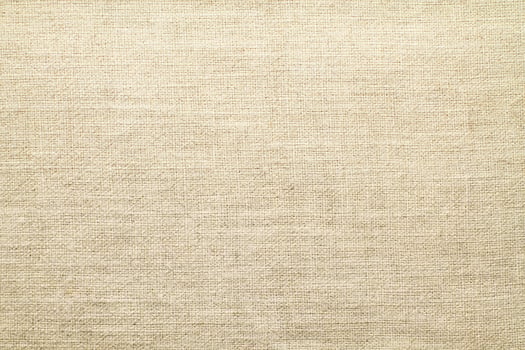 Natural linen material textile canvas Fabric texture background Close-up detail of fabric natural color Hemp material pattern design wallpaper. can be used as background or for graphic design photo