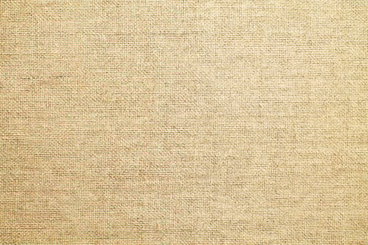 Natural linen material textile canvas Fabric texture background Close-up detail of fabric natural color Hemp material pattern design wallpaper. can be used as background or for graphic design photo