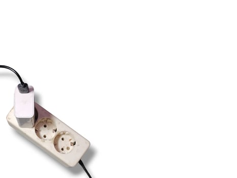 White electrical plug in wall socket. photo