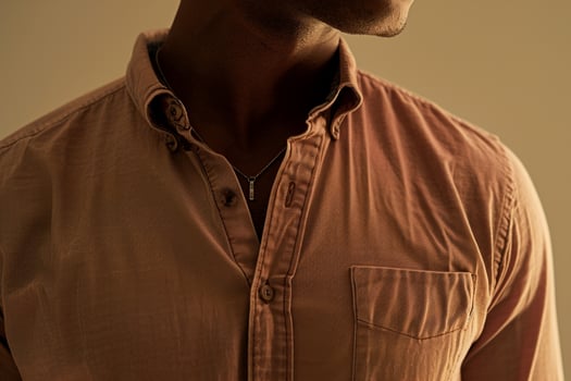 Handsome male in a Light khaki relaxed henley shirt stylish and casual portrait modern lifestyle fashionable male dress relaxed Maleswear photo