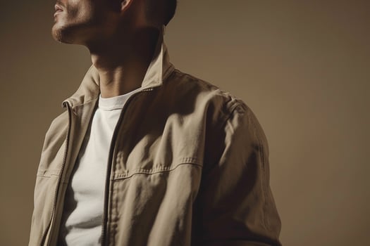 Fashionable male model in zip up jacket with taupe modern fashion portrait stylish and relaxed lifestyle photo