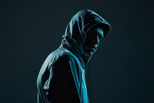 Handsome male model in a sporty tracksuit with a charcoal black background Featuring contemporary athletic style and vibrant design with chic eleMalets photo
