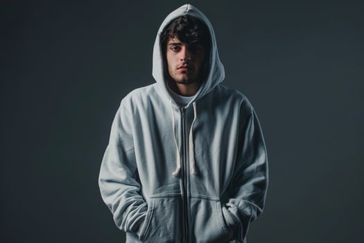 classic zip up hoodieposed in a male dress with a cloth Males backgroundfocusing on lifestyle and fashion portrait photo