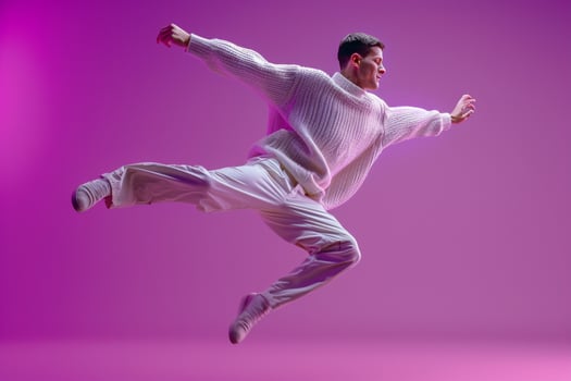 Sweater Clad Male with Bright purple Background Fashion portrait Highlighting Modern Trends and Stylish Lifestyle photo