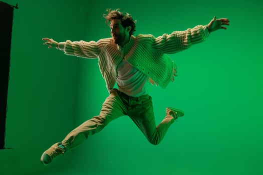Sweater Clad Male  Fashion portrait with electric Green Background Reflecting a Casual and Contemporary Fashion Approach photo