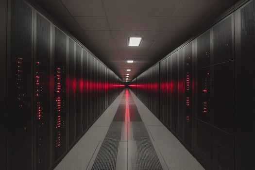 Modern supercomputer running calculations with glowing red lights photo