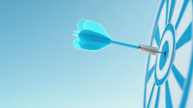 A close-up of a blue dart hitting the bullseye of a target, symbolizing success and achievement in goals and objectives. photo