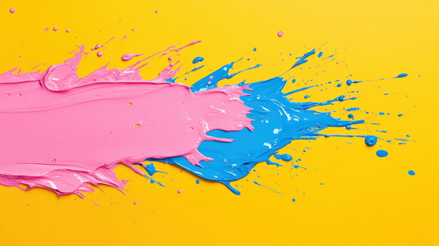 Vibrant splash of pink and blue paint on a bright yellow background, showcasing an artistic and colorful texture. photo