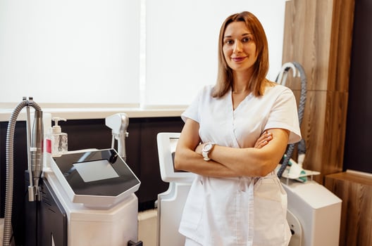 Cosmetologist dermatologist in a beauty clinic. Facial treatment photo