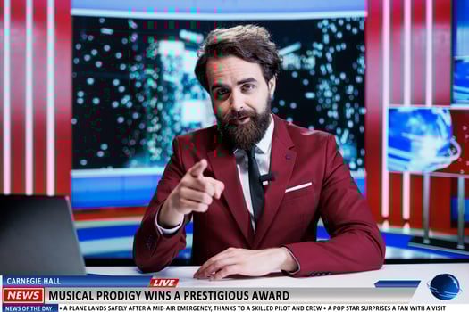 Talk show host discuss about artist receiving musical award for great performance, musician on chart top with new song. News presenter doign reportage about singer accepting prize. photo