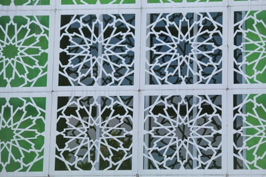 An Islamic ornament on a building photo