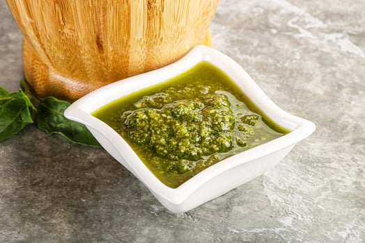 Homemade vegetarian basil pesto sauce photo