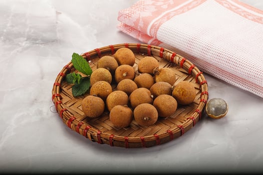 Tropical delicous fruit Longan heap photo