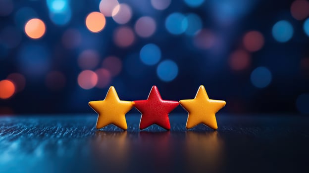 Three colorful stars on a blurred background, depicting creativity and celebration in vibrant hues. photo