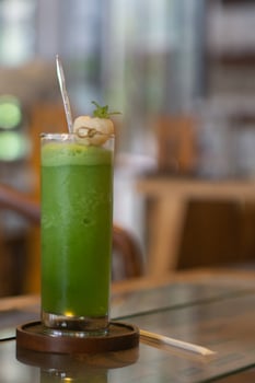 Green juice or smoothies on the table photo