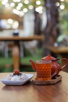 Tea and snack on the table photo
