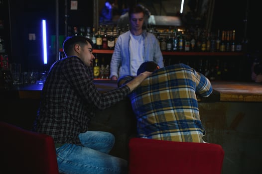 Young drunk man in bar photo