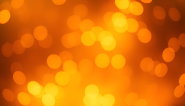 a blurry image of a bright orange light photo